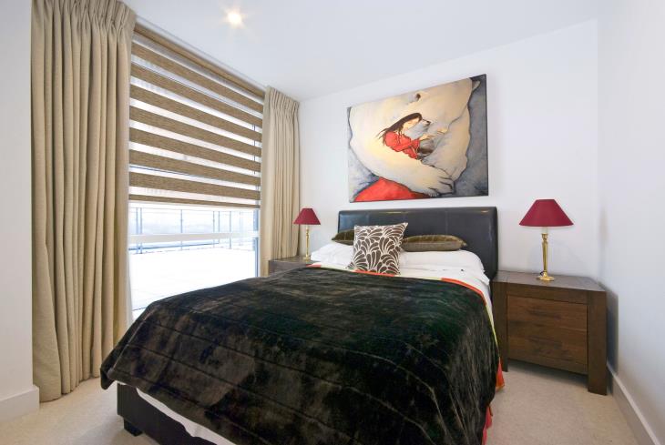 Рулонные шторы в комбинации с обычными занавесками